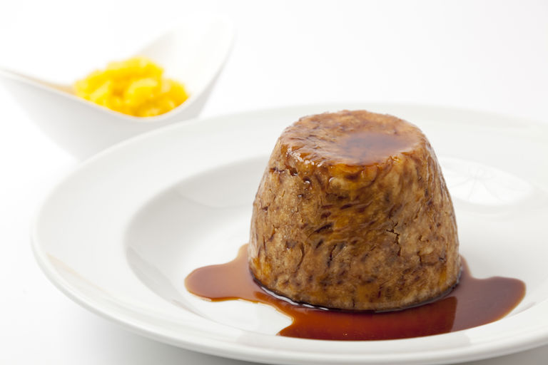 Steamed mutton and onion suet pudding with crushed swede 