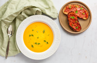 Chilled melon and olive oil soup with 'nduja toast and oregano