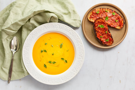 Chilled melon and olive oil soup with 'nduja toast and oregano