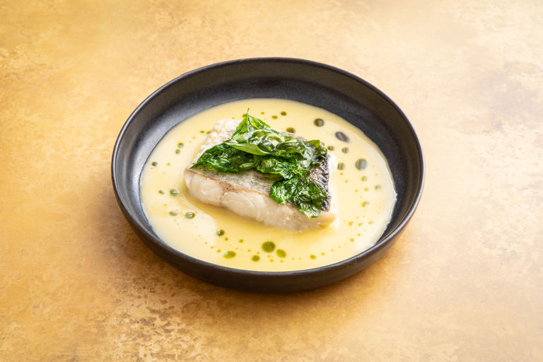 Coley with beurre blanc, fried herbs and mixed herb oil