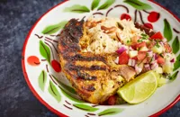Barbecued lamb chops with cashew pilaf and chopped salad