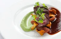Loin of venison with broccoli and stilton purée and red wine sauce