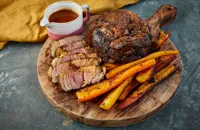 Black garlic and chipotle roast beef with beef dripping carrots