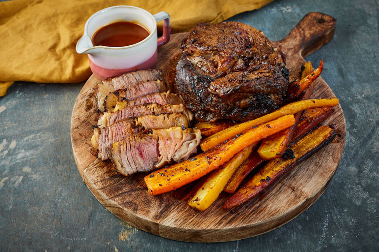 Black garlic and chipotle roast beef with beef dripping carrots