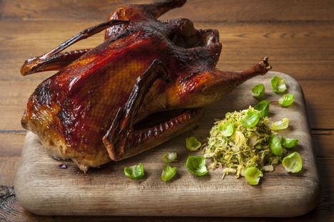 Oyster sauce-glazed goose with Brussels sprouts slaw