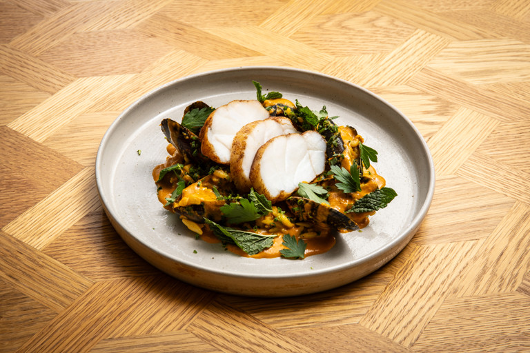 Golden monkfish with curried vadouvan mussels and orzo