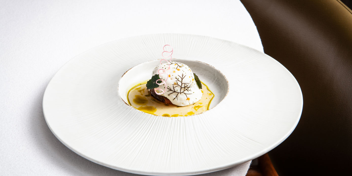 Roasted figs with fig leaf crémeux, fromage blanc espuma and verjus