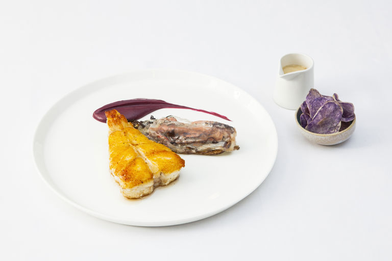 Roast turbot with red cabbage condiment, beer velouté and purple potato crisps