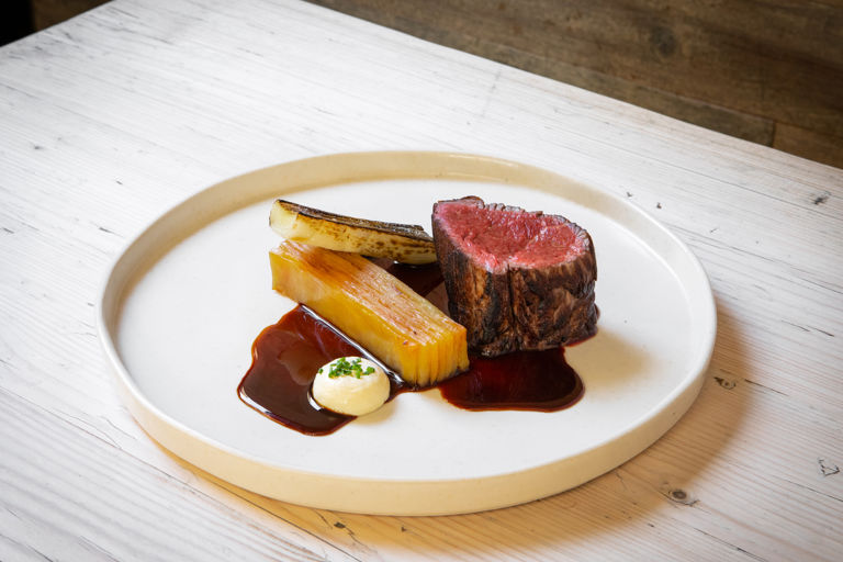 Beef fillet with pressed potato, leeks and horseradish emulsion