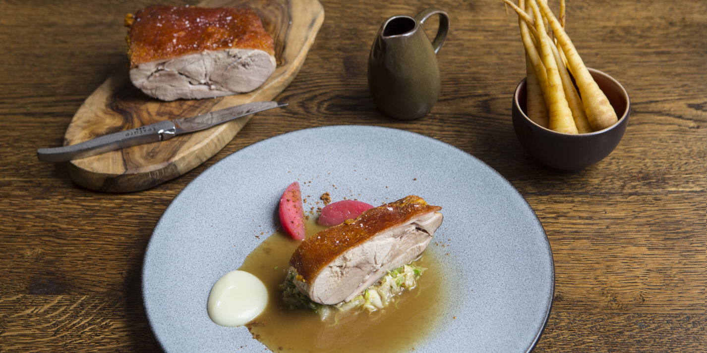 Pork shoulder with hispi cabbage and apples