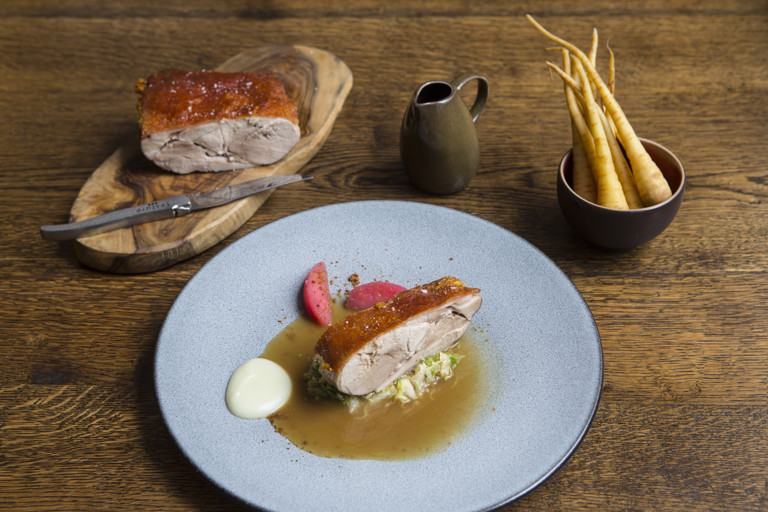 Pork shoulder with hispi cabbage and apples