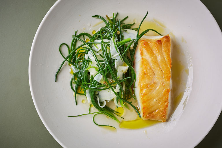 Pollock with tomato consommé and monk's beard
