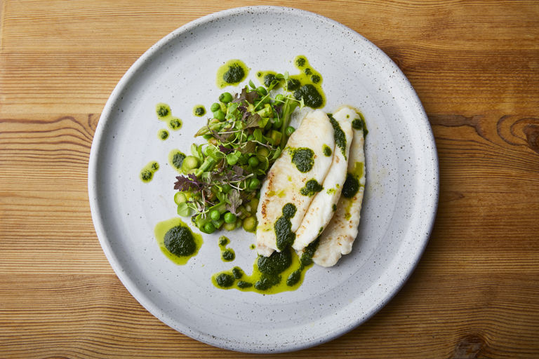 Butter-steamed lemon sole, English garden pesto, asparagus and pea salad
