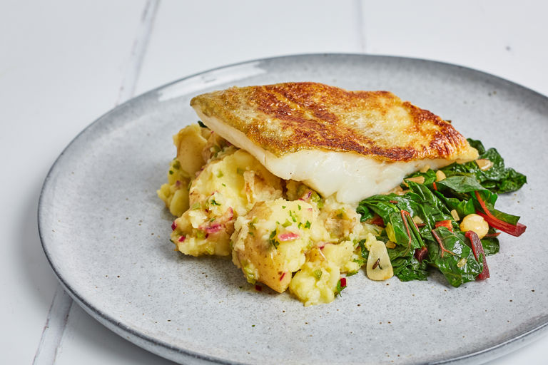 Patatas aliñadas with pan fried cod, rainbow chard and preserved lemons