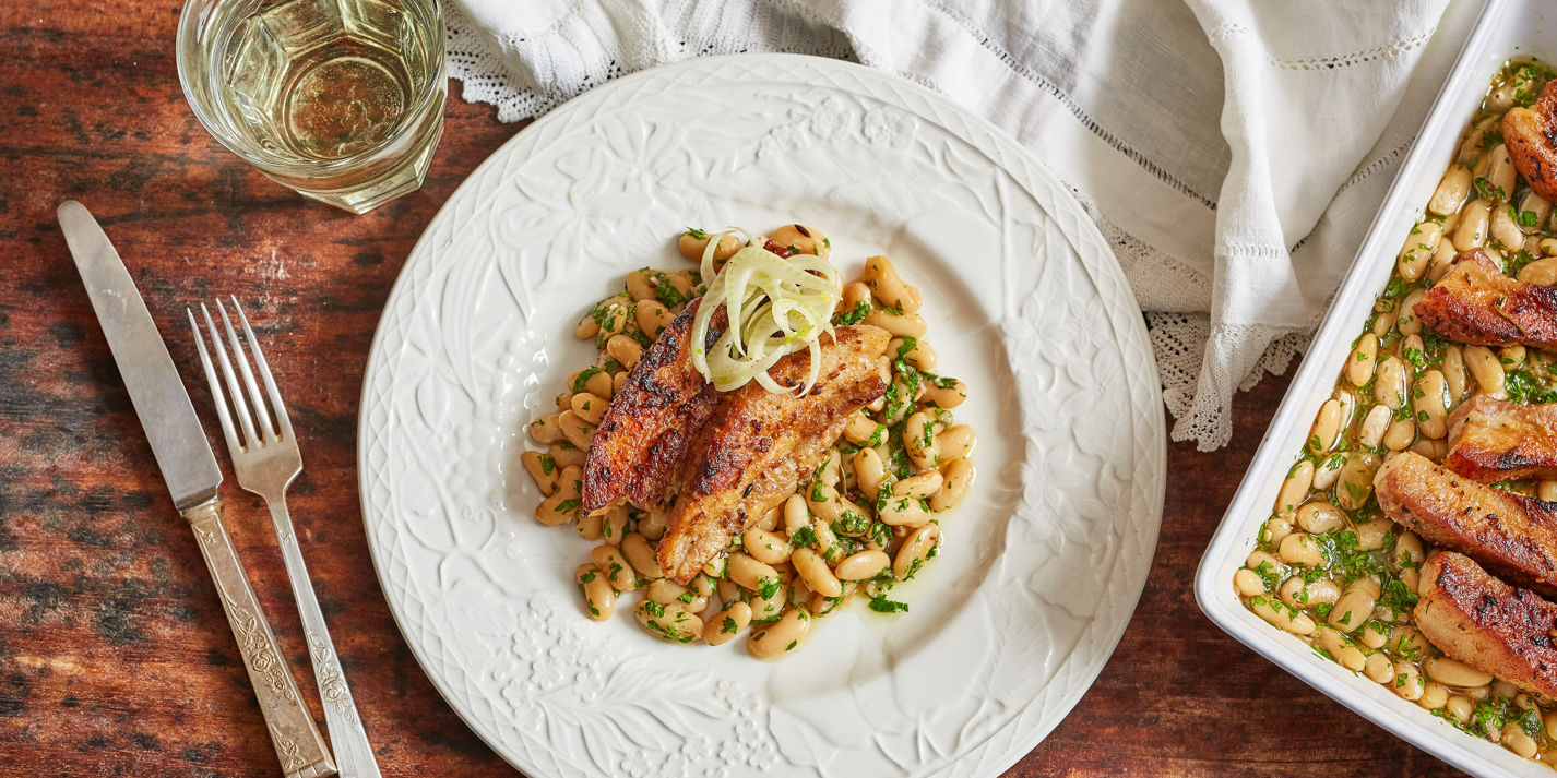Pork belly with cannellini beans and salsa verde