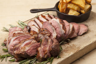 Barbecued leg of spring lamb