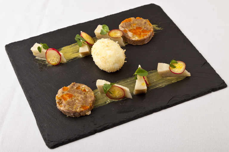 Tamworth pork terrine, roast garlic purée, deep fried egg and artichoke
