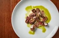 Charcoal-grilled game offal and turnip purée with a parsley, garlic and lemon dressing