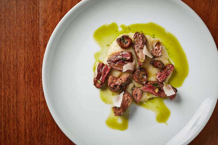 Charcoal-grilled game offal and turnip purée with a parsley, garlic and lemon dressing