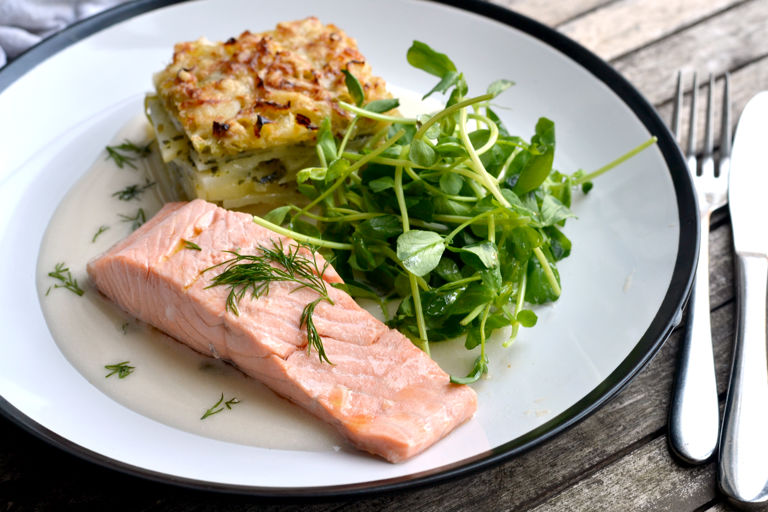 Poached salmon with potato, leek and watercress dauphinoise