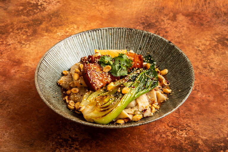 Biang biang noodles with gochujang-braised pork and bok choi