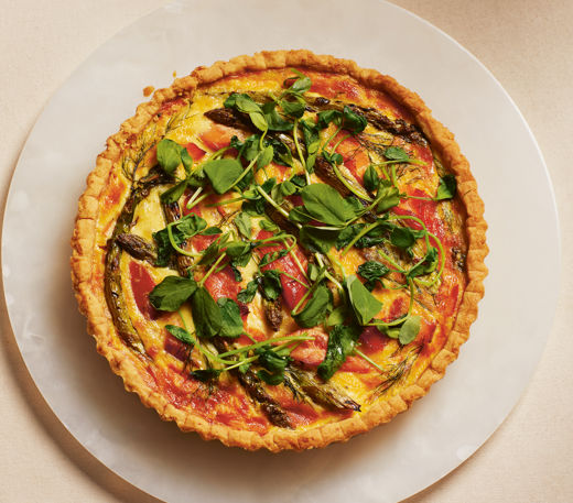 Asparagus, hot-smoked trout and pea shoot tart