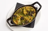 Black pudding, scampi and white bean crumble with wild garlic crust