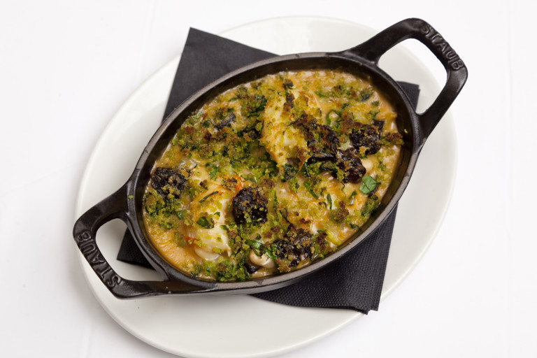 Black pudding, scampi and white bean crumble with wild garlic crust
