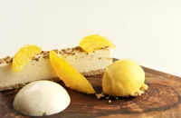 White chocolate mousse with cardamom espuma and clementine sorbet