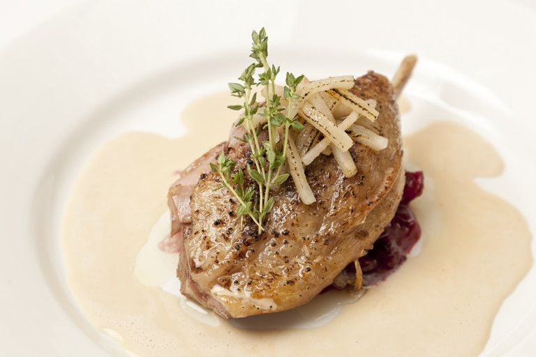 Confit duck leg, braised red cabbage, green peppercorn sauce, caramelised apples