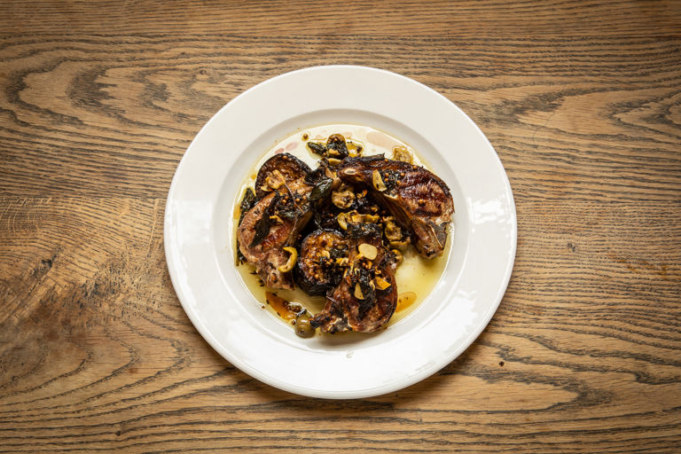 Grilled lamb chops, aubergines, green olives, mint