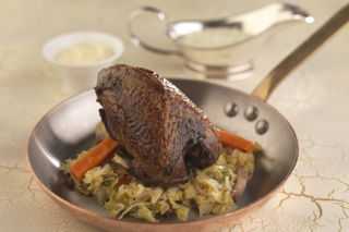 Roast grouse with braised cabbage, celeriac purée and sauce Albert