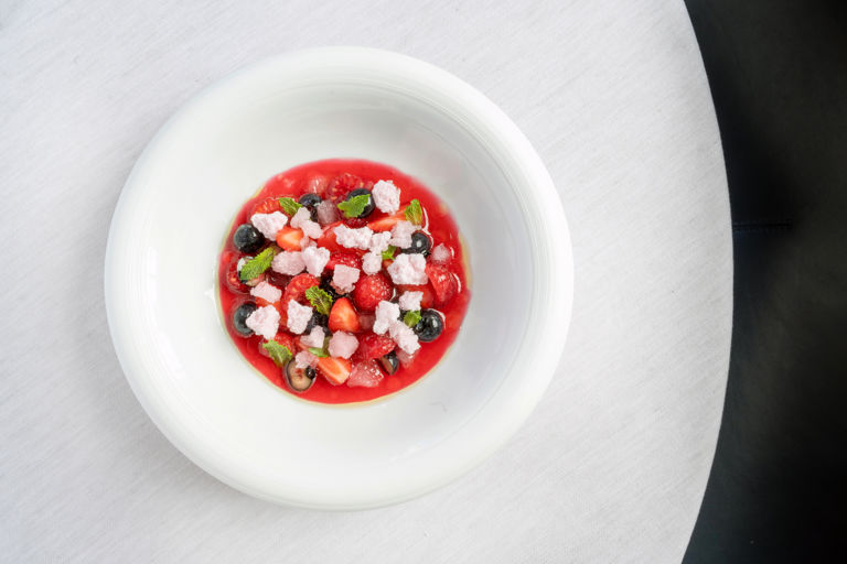 Red berry and hibiscus soup, iced rosé shavings