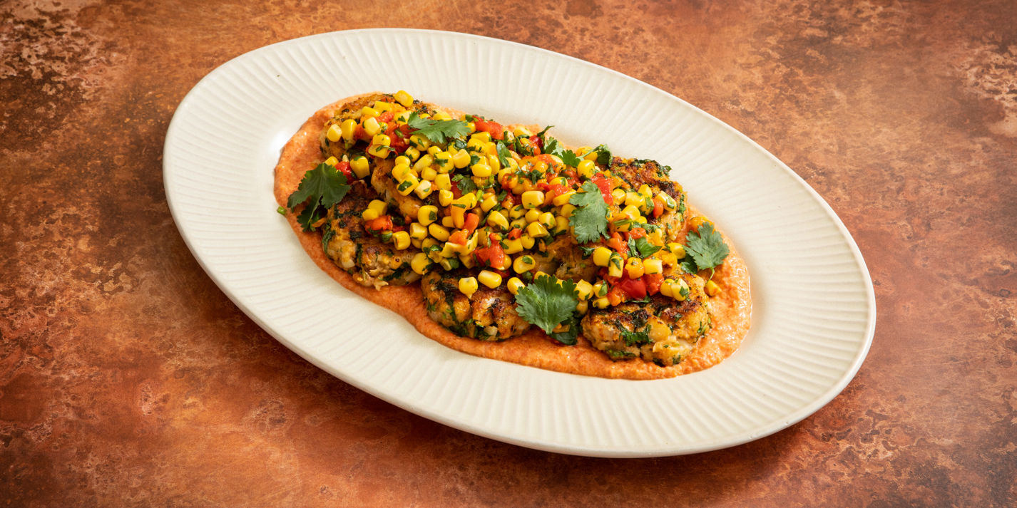 Cajun-Spiced Cod Cakes with Red Pepper Sauce and Sweetcorn Salsa Recipe - Great British Chefs