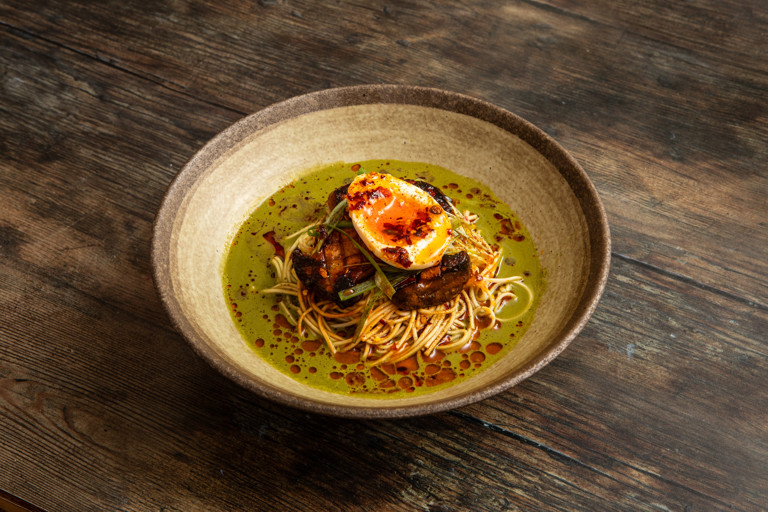 Chilled herby noodle soup with brown sugar chilli oil and king oyster mushrooms
