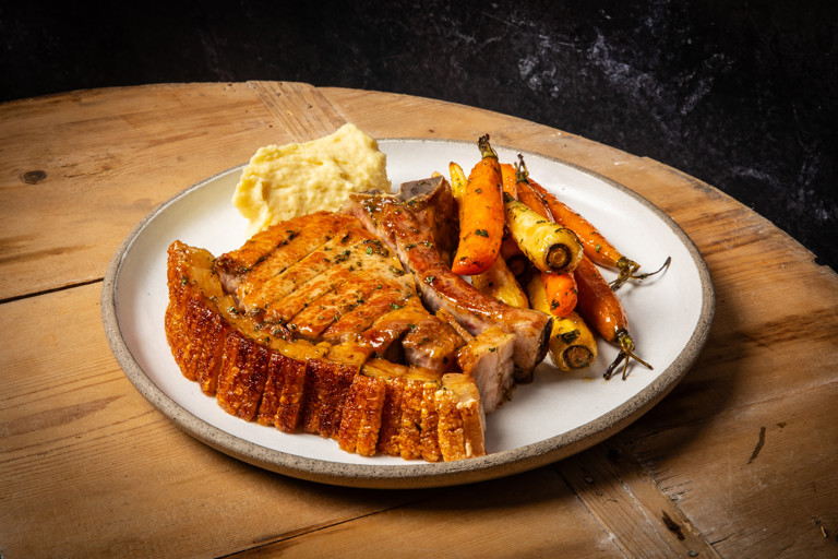 Malt-vinegar glazed pork chops with carrots, parsnips and Dijon pommes purée