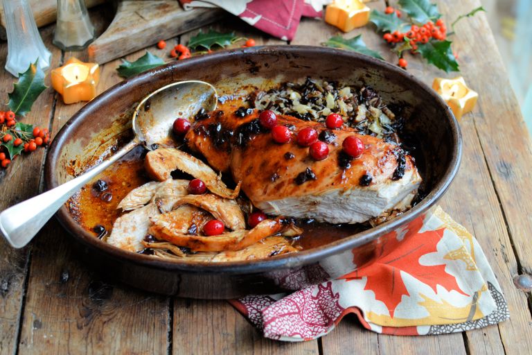 Cranberry-glazed roast turkey breast with wild rice stuffing