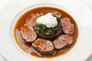 Loin of Welsh Lamb with tapenade and spiced aubergine