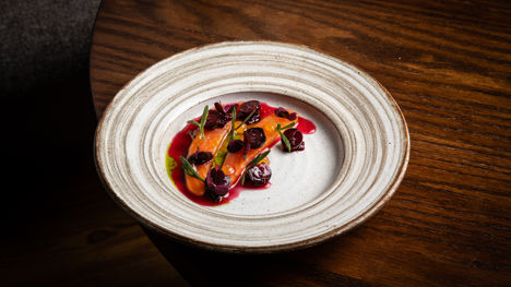 Pine-cured Chalkstream trout with Worcester berries, blackcurrant and jalapeño