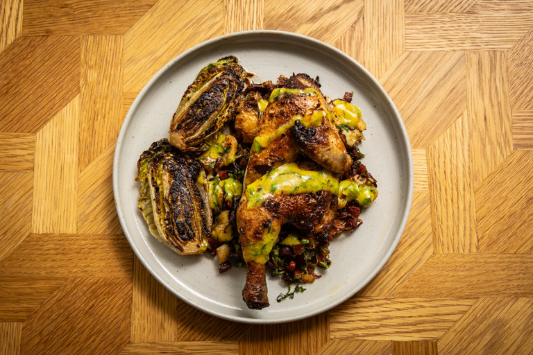 Spatchcock poussin with chorizo potatoes, braised gem lettuce and mustard dressing