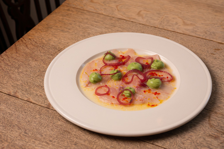 Sea bass ceviche with red-wine pickled onion and avocado purée