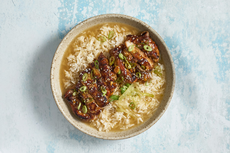 Burnt honey teriyaki chicken with garlic chicken bone broth over rice