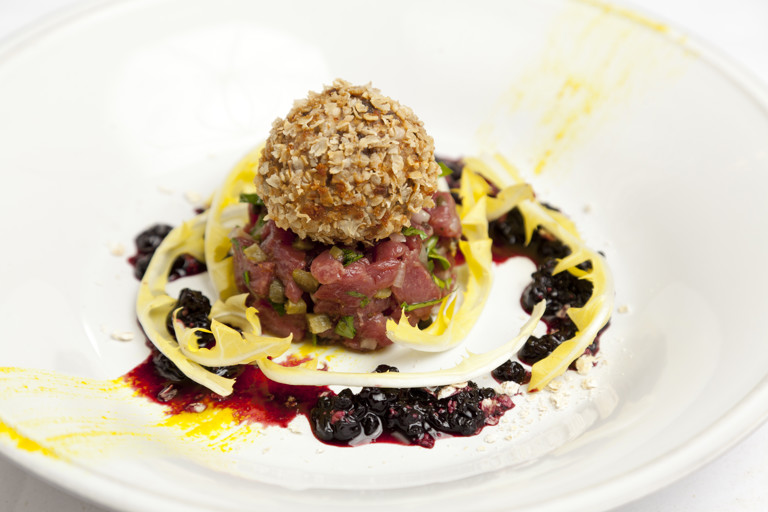 Venison tartare with haggis Scotch egg and elderberry dressing