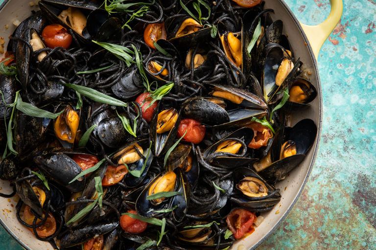 Squid ink spaghetti with mussels and tomato confit 