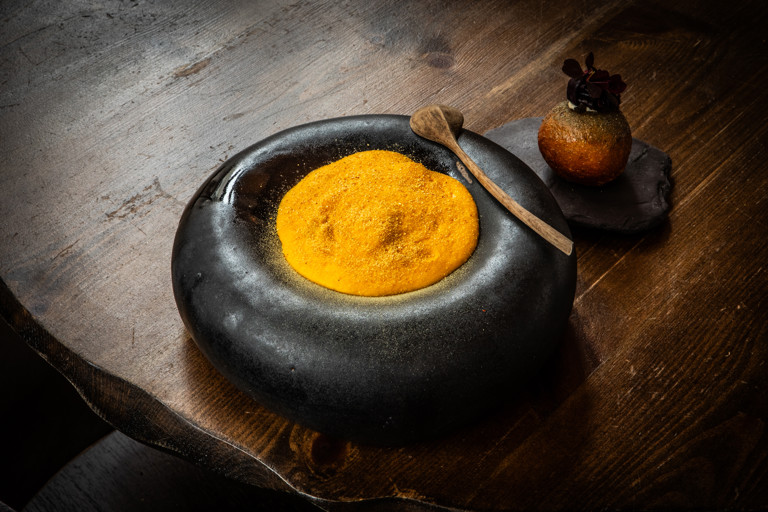 Squash and prawns with marigold bisque and sprat cream doughnut