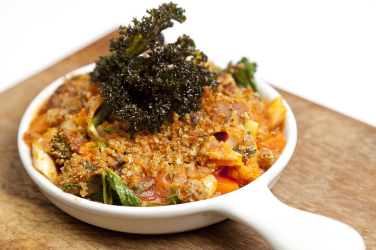 Vegetable and chestnut stew with sage crust and crispy kale