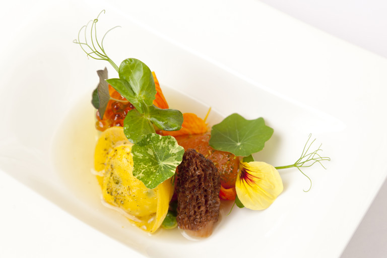 Sea trout with garden pea, nasturtium and langoustine dashi