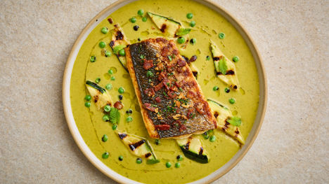 Sea bass with smoky pea and mint sauce and grilled courgettes