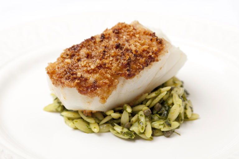 Macadamia-crusted Alaska black cod fillet with orzo and salsa verde