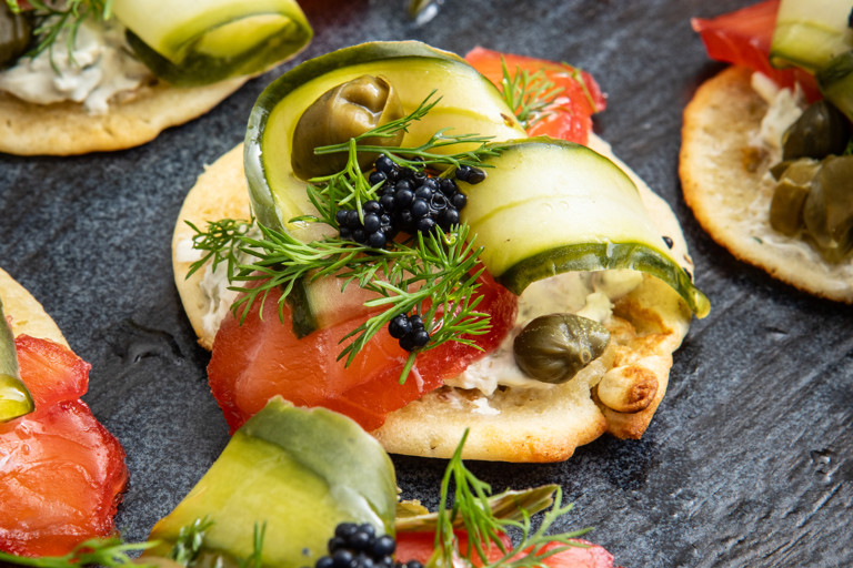 Gin and beetroot-cured salmon blinis